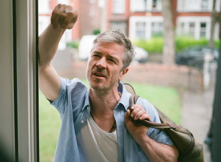 A man knocks at the door in Housewarming